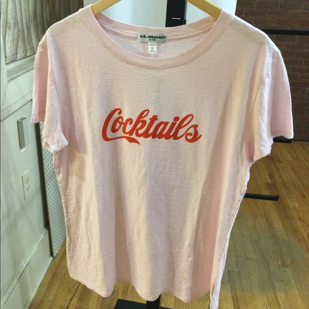 NWT Suburban riot tee.